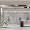 Modern Clothing Store Interior With Gray Walls Hanging Clothes Moon Installation Wooden Display Tables