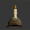 Decorative Candle With Flame On Turtle Shaped Base And Colorful Patterns