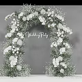 Elegant Banquet Hall With White Floral Decor Wedding Arch Aisle Candles And Chairs