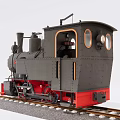 Vintage Steam Train Model Black Body And Red Base On Railway Track