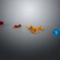Colorful Liquid Splashes In Red Orange Yellow And Blue On Gray Background