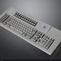 White Electronic Computer Keyboard With Standard Key Layout And Numeric Keypad