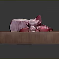 Freshly Sliced Red Onion Pieces Arranged On Wooden Cutting Board
