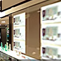 Bright Pharmacy Store Interior With Well Organized Shelves And Medicine Displays