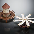 Stone Tower With Red Pointed Roof And Wooden Platform Plus Windmill Like Wooden Blade Structure