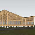 Wooden Homestay Building With Large Windows Sloped Roof In Golden Wheat Field Surrounded By Trees