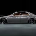 Sleek Modern Silver Sedan With Black Alloy Wheels And Brown Leather Seats