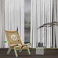 Rattan Lounge Chair in Modern Bright Interior with Large Window Curtains and Decorative Plant