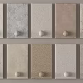 Different Colored Textured Wall Panels With White Knobs For Interior Decor