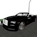 Black Open Top Luxury Car With Red Accented Wheels And Chrome Grille On Scenic Road