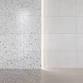 Modern Interior Wall Design Featuring White Speckled Texture And Smooth Tile Surfaces