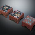 Three Square Wooden Stools With Colorful Floral Patterns And Traditional Design