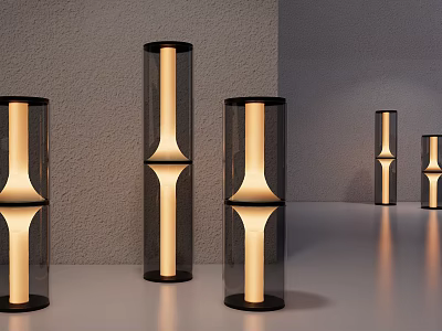Modern Cylindrical Table Lamps With Black Base Transparent Shade And Warm Yellow Light 3d model