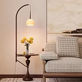 Stylish Floor Lamp By Sofa With Checkered Cushions Side Table And Yellow Flowers