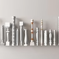 Collection Of White Railing Spindles With Gold Accents And Various Designs