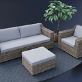 Rattan Sofa Coffee Table Combination with White Cushions and Matching Chair and Green Decorative Plant