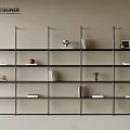 Modern Designer Bookshelf With Black Frame And Layered Shelves Holding Books And Decorative Items