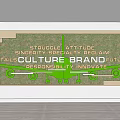 Green Plant Wall Featuring Motivational Keywords Like Struggle Attitude Brand Culture Future