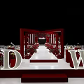Elegant Banquet Hall With Red Decor D And W Letters Red Carpet And Flower Arrangements