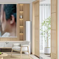 Modern Living Room Interior With Beige Sofa Round Ottoman Wooden Shelf And Potted Plants