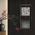 Two Modern Abstract Paintings on Black Wall with Golden Frames and Vase on Wooden Stand