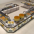 Stainless Steel Display Shelves with Glass Doors Holding Food Pastries and Breads in Retail