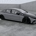 Mercedes Benz Electric Sedan With Sleek Gray Black Design And Large Wheels In Studio