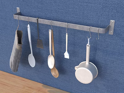 Various Cooking Utensils Hanging On Wall Mounted Metal Rack Against Blue Wall 3d model