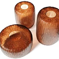 Three Brown Textured Cylindrical Home Decor Pieces 3d model