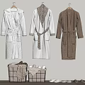 Soft Bathrobes Hanging On Wall With Storage Baskets Towels And Slippers