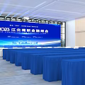 Banquet Hall Interior With Large Blue Screen Stage White Seats For Financial Summit City View