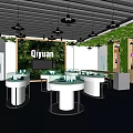Modern Qiyuan Store Interior With Green Plant Walls White Round Display Tables And Hanging Lamps