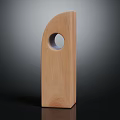 Light Colored Wooden Sculpture With Rectangular Shape And Circular Hole On Dark Background