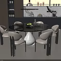 Modern Dining Table Set With Round Black Table White Chairs Green Fruits And Glassware