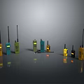 Various Colored Walkie Talkies With Antennas On Gray Surface