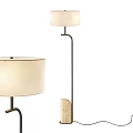 Modern Floor Lamp With Beige Lampshade Curved Metal Pole And Woven Base Design