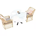Wicker Chair And Table Set With Blue White Checkered Tablecloth And Lace Trim