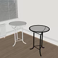 Two Modern Side Tables With Glass Tops And Silver Black Metal Frames In Room Corner