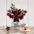 Transparent Glass Vase With Pink Red Flowers Green Leaves On Tabletop With Book And Pomegranate