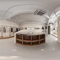 Modern Clothing Store Interior Featuring Clothing Racks Displayed Apparel And Checkout Counter