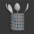 Stainless Steel Spoons In Perforated Metal Container With Blue Dots On Dark Background
