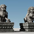 Pair of Sitting Stone Lion Statues as Garden Ornaments with Ornate Pedestals