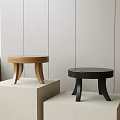Modern Wooden and Black Stools on Display Stands in Minimalist Interior