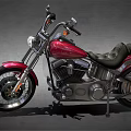 Classic Red Cruiser Motorcycle with Black Leather Seat Chrome Engine and Shiny Tires