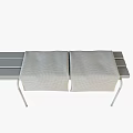 Outdoor Table with Wooden Top White Metal Legs and Zigzag Patterned Blanket Brown Beige Purple