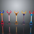 Colorful Standing Objects With Curved Tops In Vibrant Hues On Black Surface