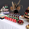 Commercial Dessert Display Equipment with Tiered Stands and White Table Setup