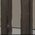 Five Different Shaped Wooden Columns Against Light Colored Wall And Gray Floor