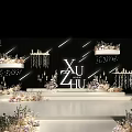 Wedding Stage Decor with Black Background White Letters XU4U Floral Arrangements Hanging Lamps and Candles
