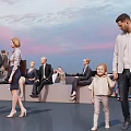 Group of People Relaxing Outdoor Evening Sitting on Benches with Sunset Sky and Smartphones